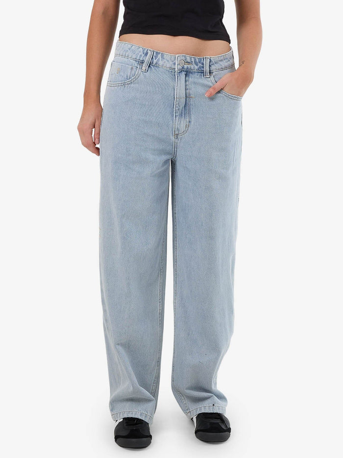 Female model wearing our Thrills Tony Jean in Blue standing against a plain studio background.