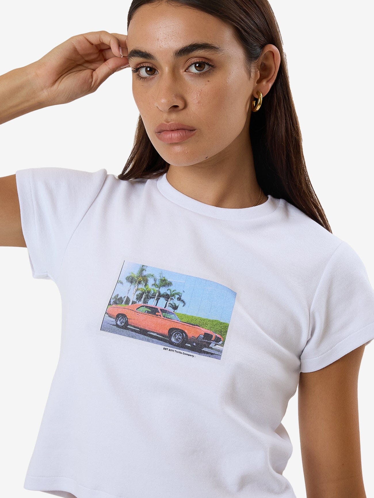 Female model wearing our Thrills standing against a plain studio background.