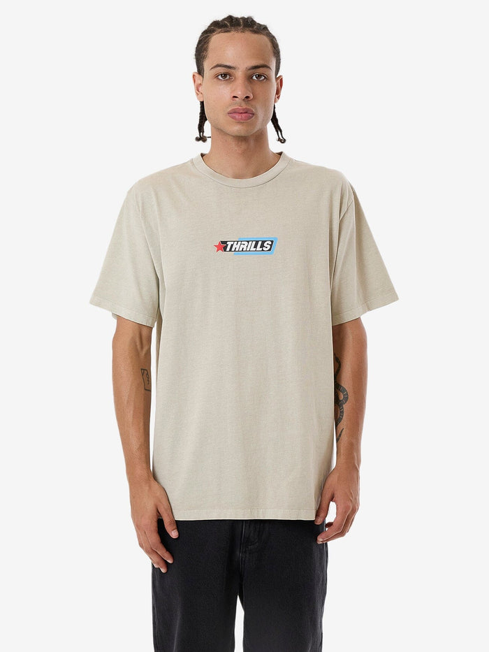 Male model wearing our Thrills Lockstar Merch Fit Tee in Grey standing against a plain studio background.