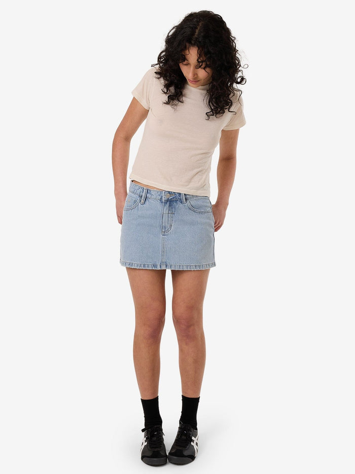 Female model wearing our Thrills Sophie Skirt in Blue standing against a plain studio background.