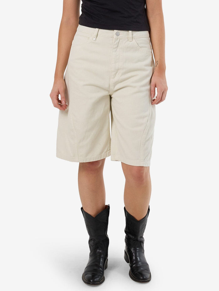 Female model wearing our Thrills Ronnie Short in White standing against a plain studio background.