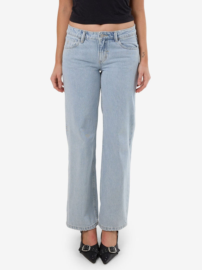 Female model wearing our Thrills Saskia Jean in Blue standing against a plain studio background.