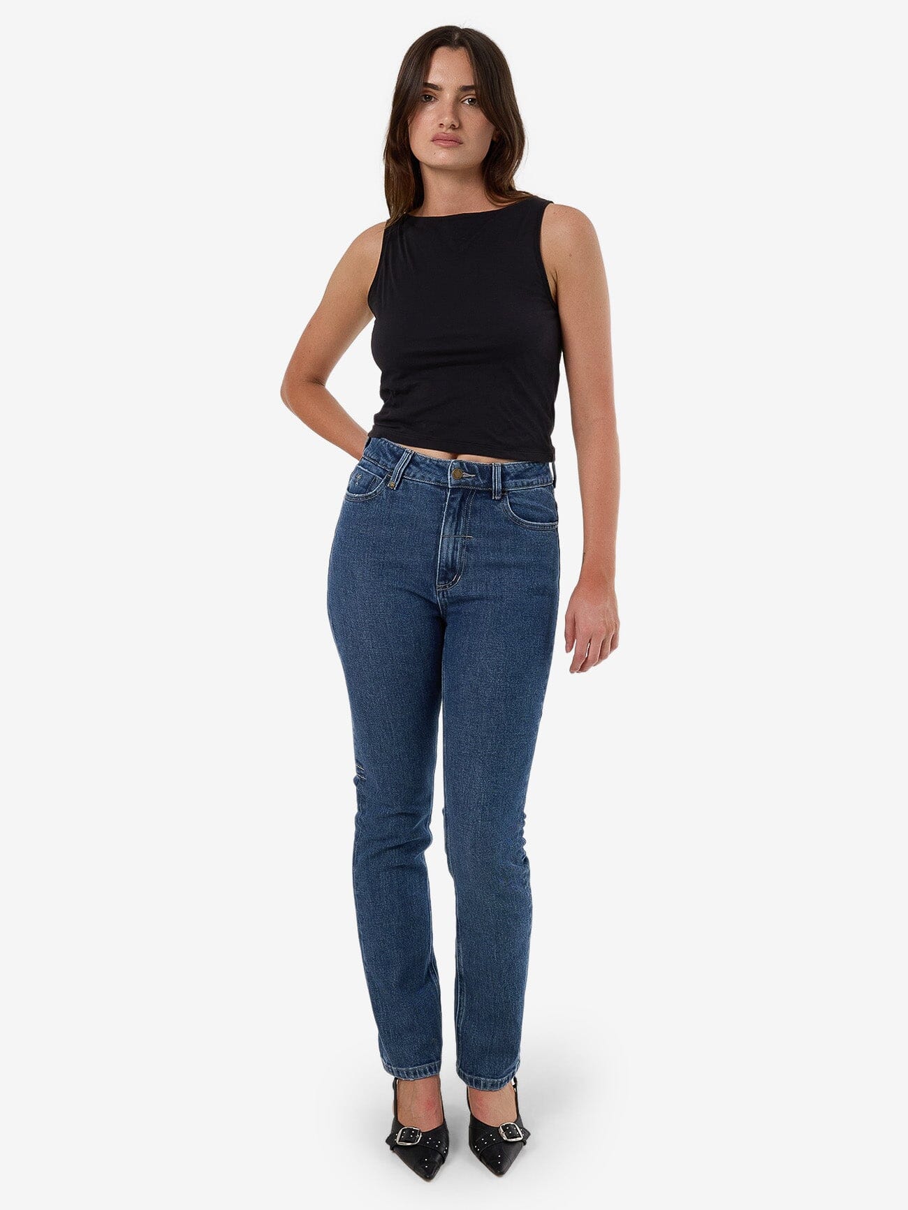 Female model wearing our Thrills Nicole Jean in Blue standing against a plain studio background.