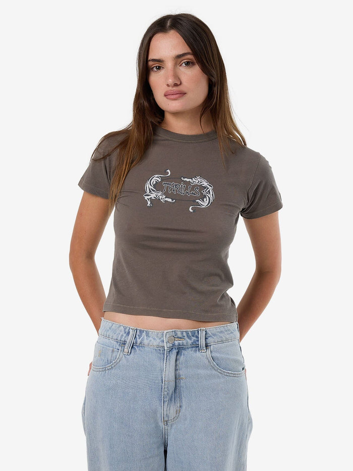 Female model wearing our Thrills Decisions Boy Tee in Grey standing against a plain studio background.