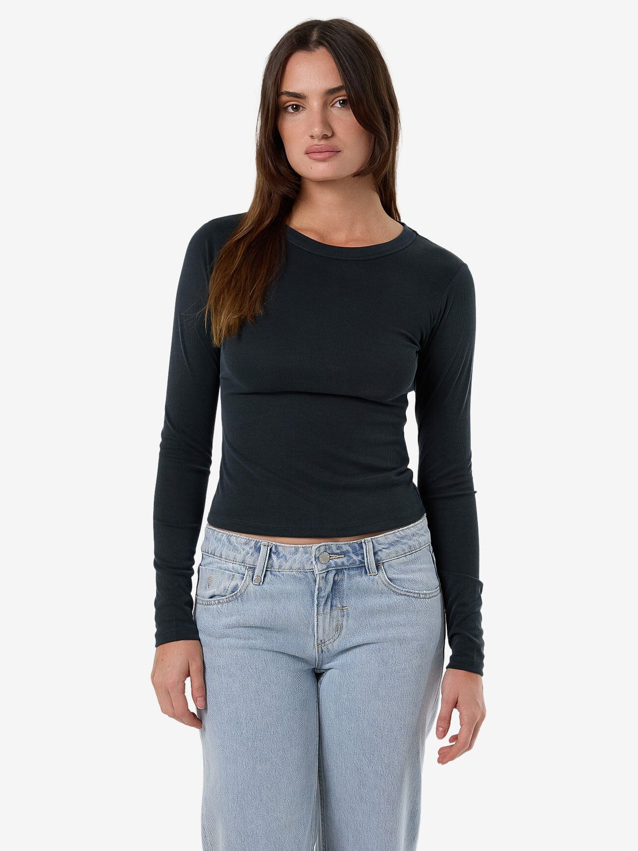Female model wearing our Thrills Ryden Micro Rib Top in Grey standing against a plain studio background.